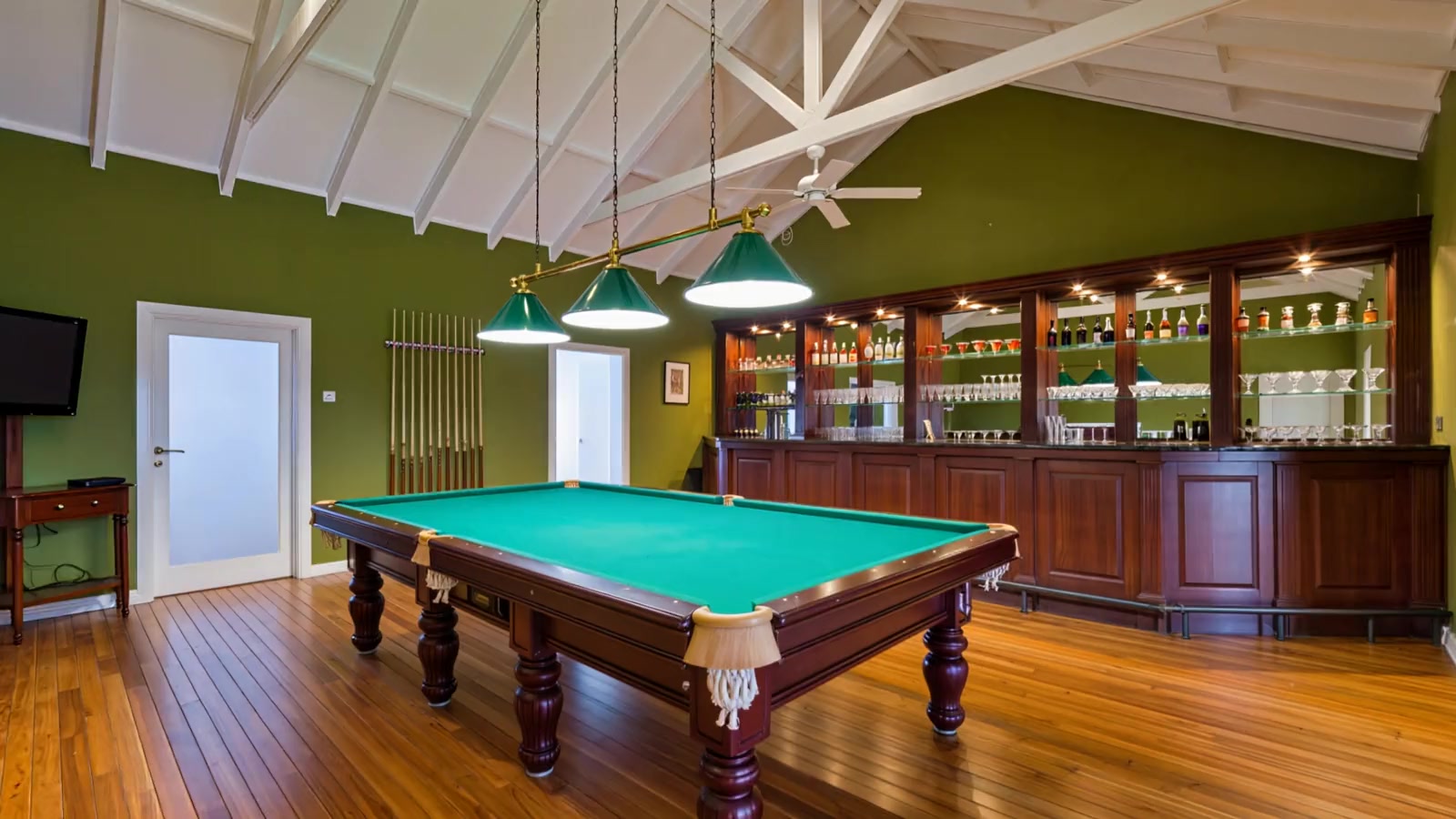 The original listing photo of the billiard room